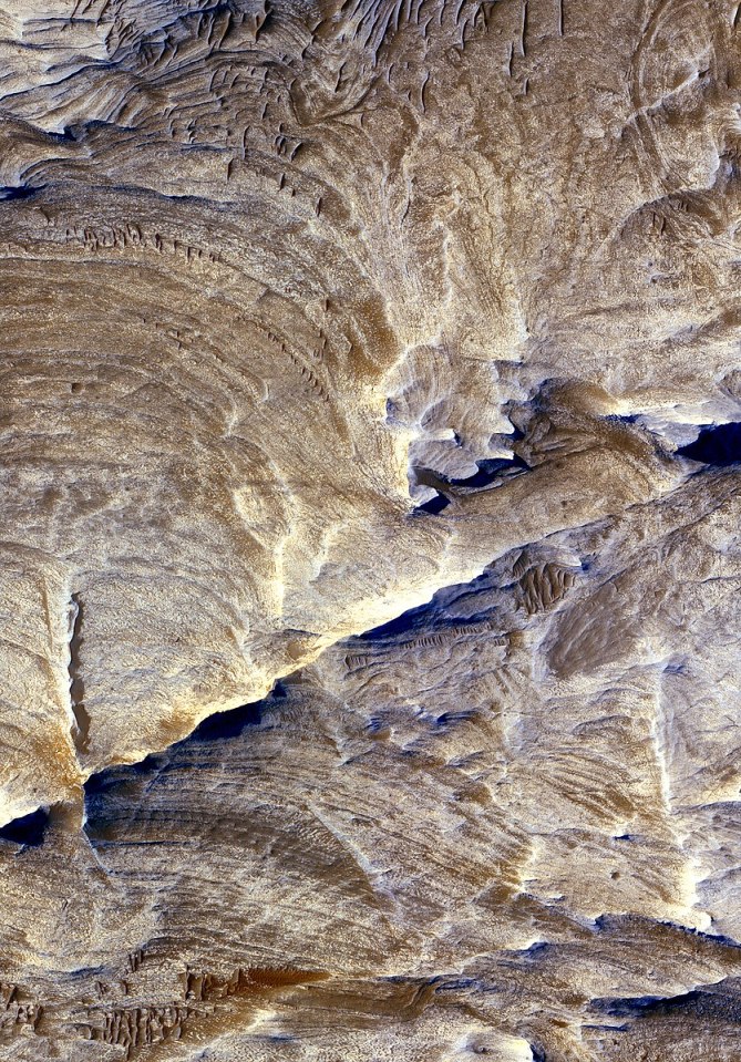  The MRO previously captured this image of the Candor Chasma region of Valles Marineris