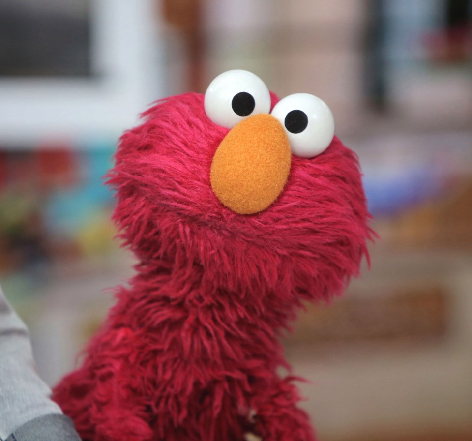 Elmo is giving kids virtual hugs and explaining he will be around on video chat