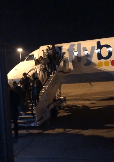  Stranded passengers leave one of Flybe's last ever flights last night