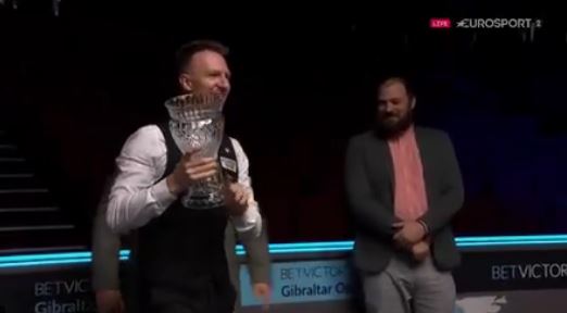 Judd Trump celebrated his win in front of an empty arena