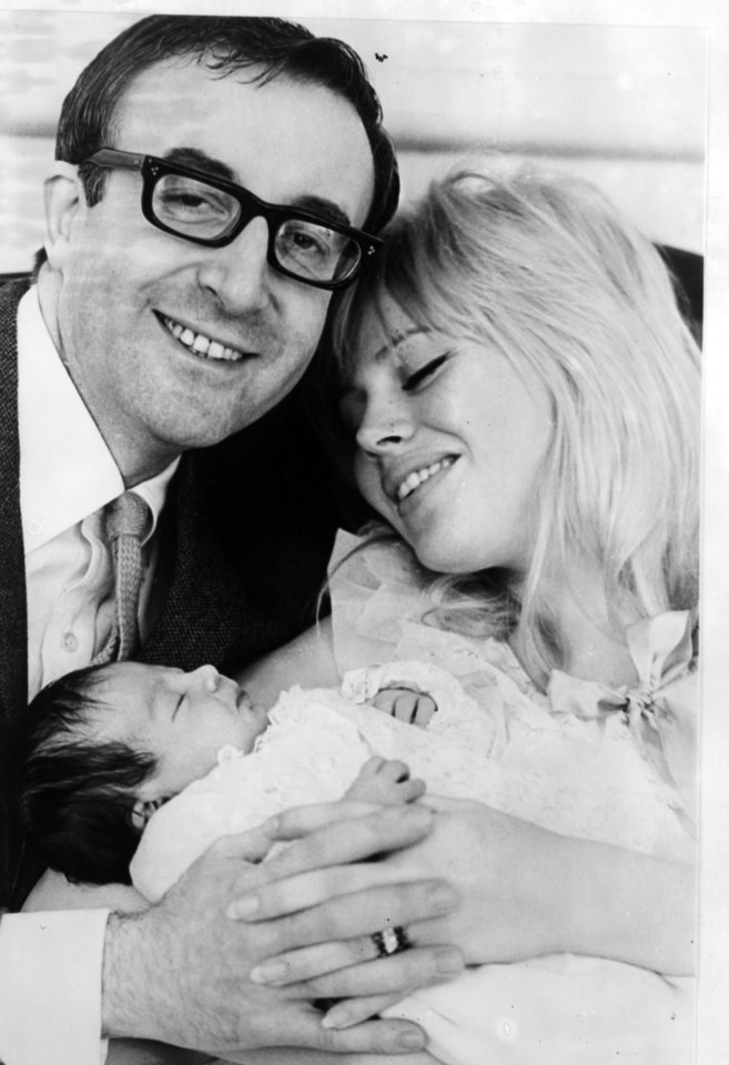  Ekland pictured in 1965 with her husband Peter Sellers and her baby Victoria