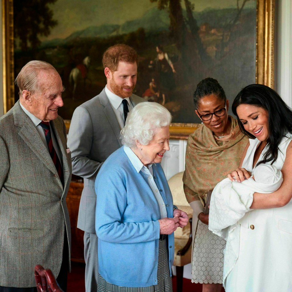  The first time the Queen met Archie, two days after he was born, at Windsor Castle