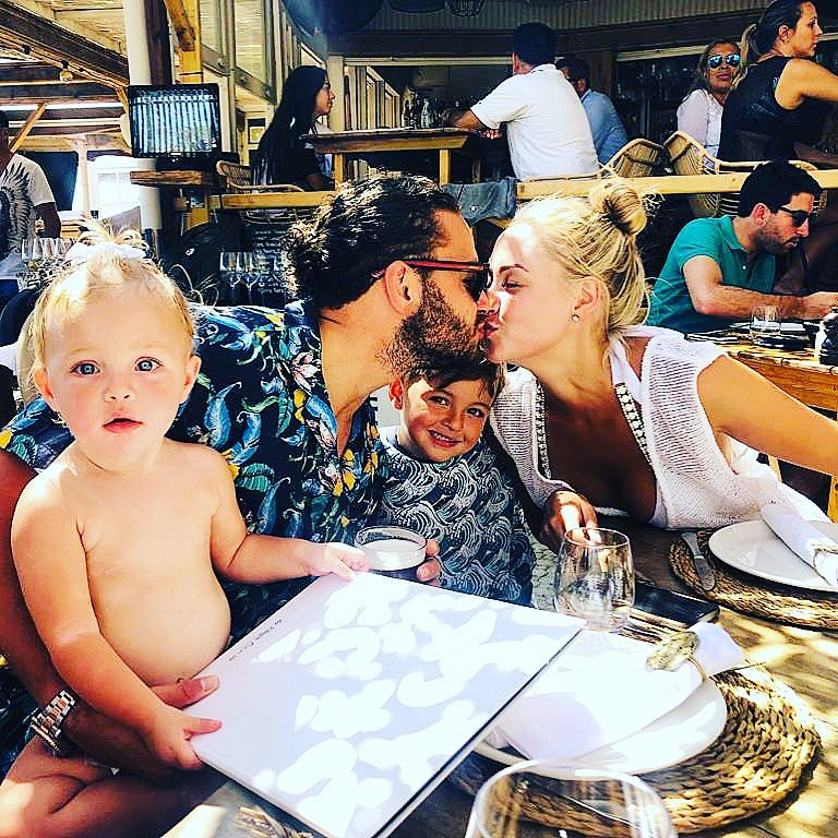 Adam and his family in his restaurant The Spinn