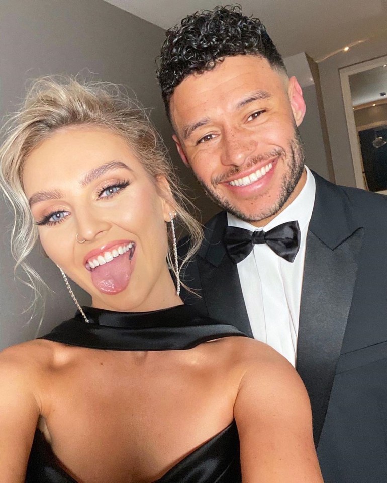  Perrie, with Liverpool striker Alex, says 'It’s hard due to the distance but I adore him'