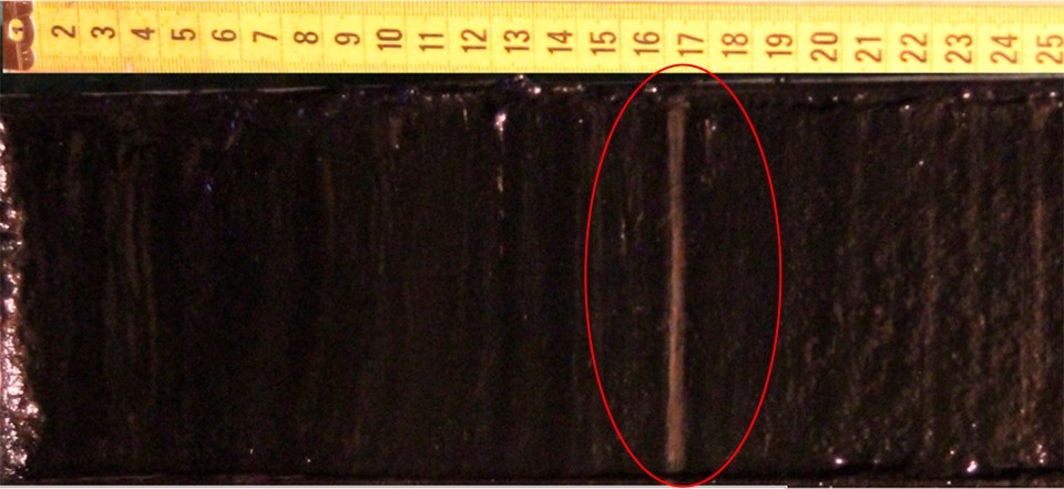  The core sample here shows an obvious lighter colour clay that was formed around the time of the explosive event