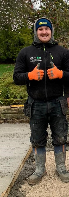  Landscape gardener Stephen Cochrane, 36, posed for a snap before being forced to evacuate