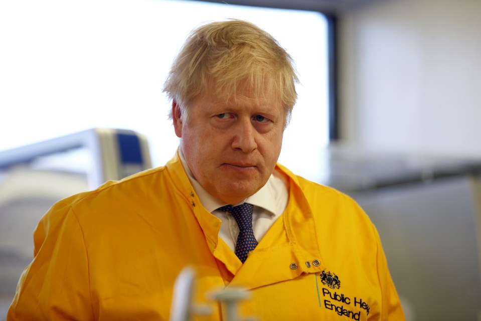  Boris Johnson visits a laboratory at the Public Health England National Infection Service in Colindale, north London