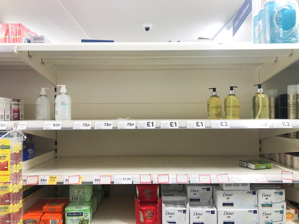 Empty shelves are out of hand wash at a supermarket in Britain