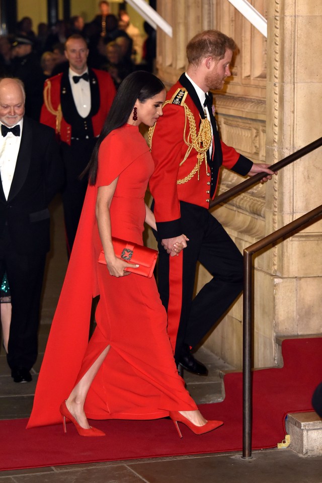 The couple received a standing ovation at the Royal Albert Hall as they undertook one of their last royal engagements