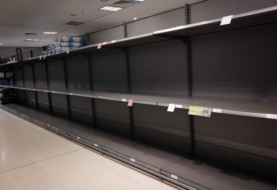 Empty shelves as toilet roll is sold out, in a Waitrose store in London