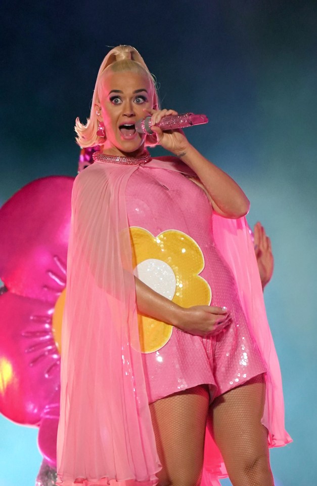  Katy Perry, pregnant with her first child with Orlando Bloom, performs on stage after the Women's T20 World Cup final match between Australia and India