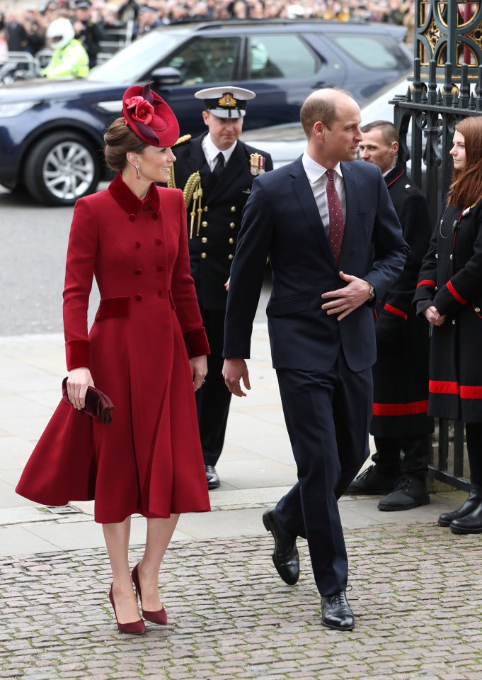 Kate Middleton and Prince William walk through the front entrance