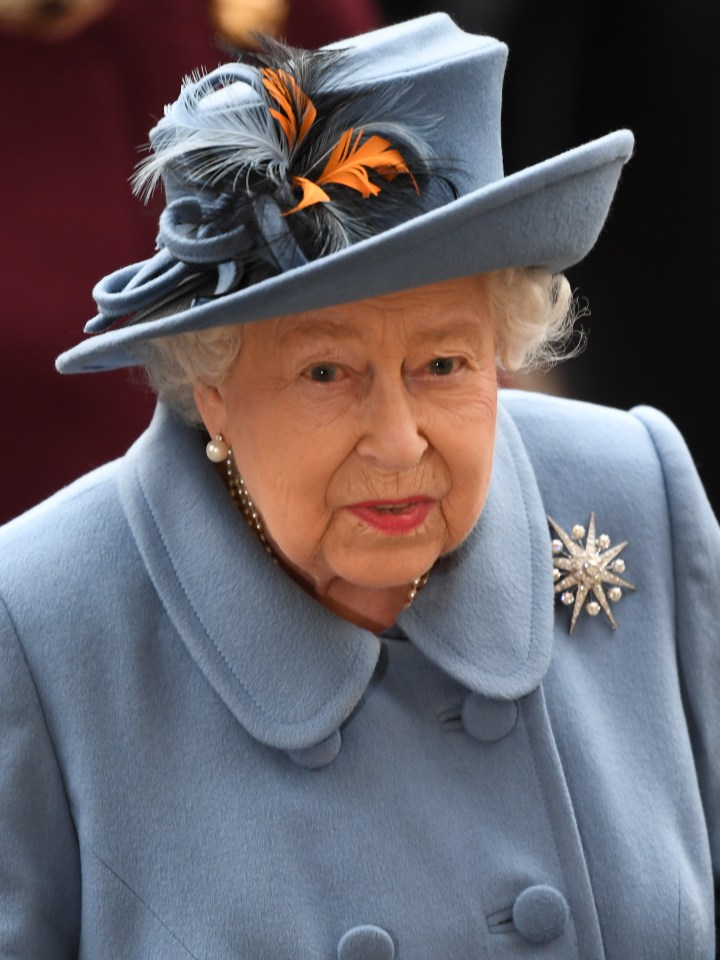 The Queen looks regal in a powder blue coat