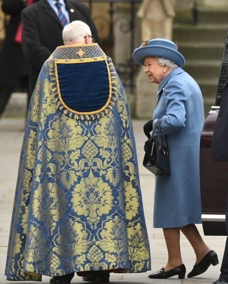 Queen Elizabeth II is greeted outside the abbey as she arrives to celebrate the Commonwealth