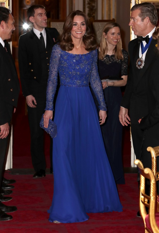 Kate wore this stunning sapphire gown tonight to host a reception at Buckingham Palace