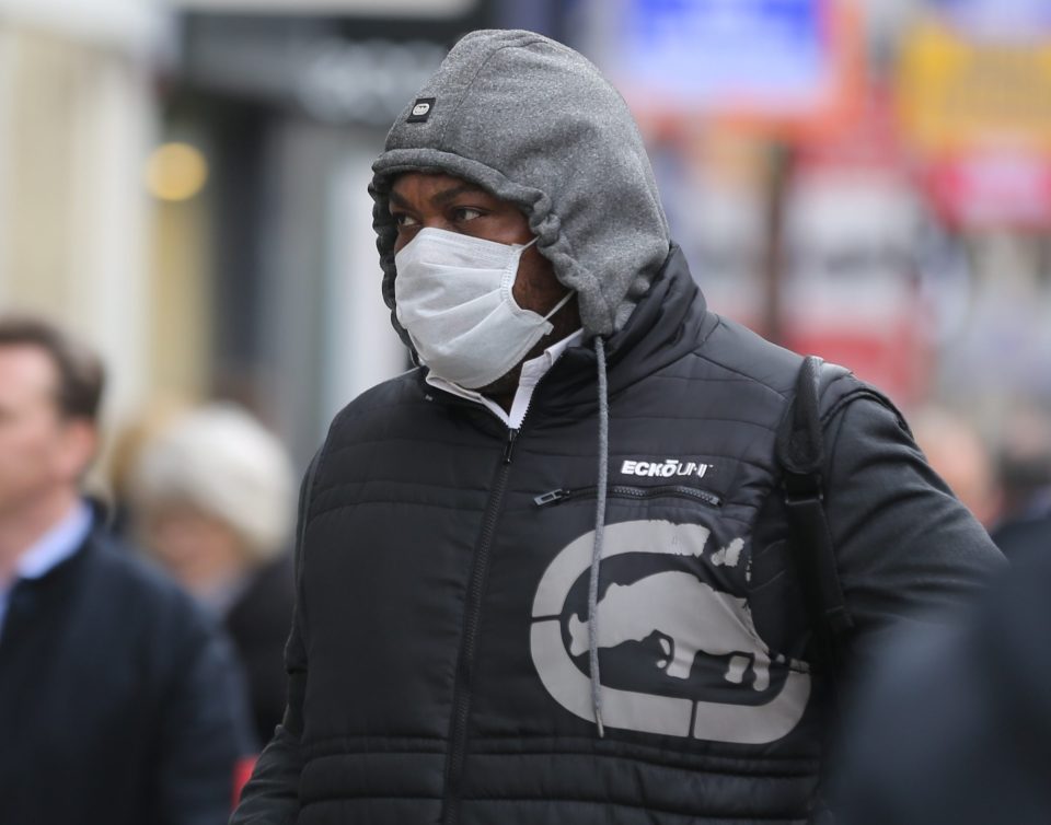  People wear medical masks as a precaution against coronavirus