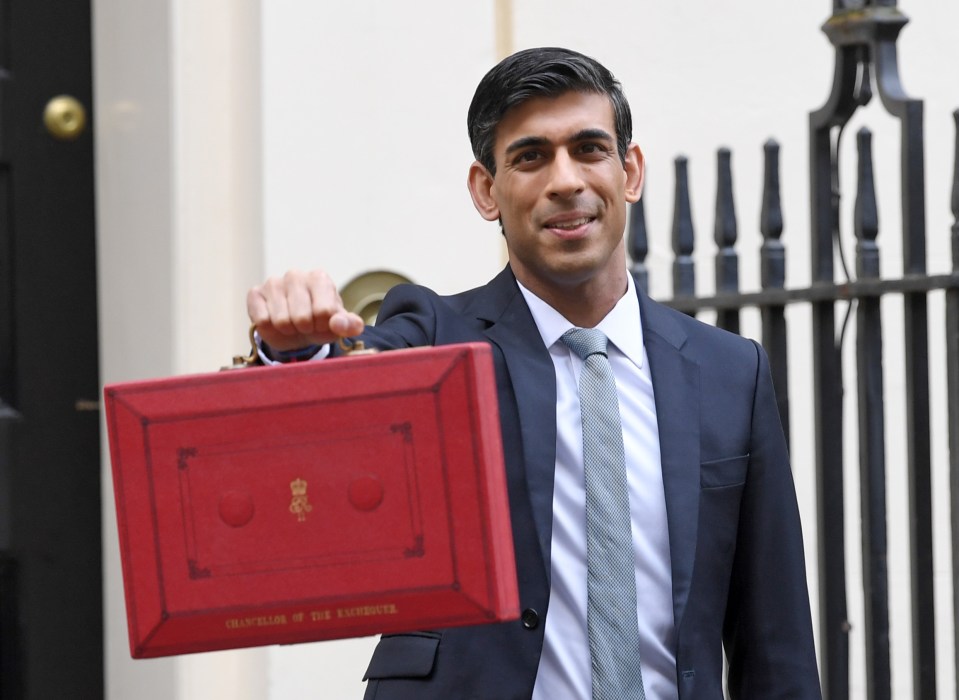  Chancellor Rishi Sunak holding up his red box today ahead of the Budget