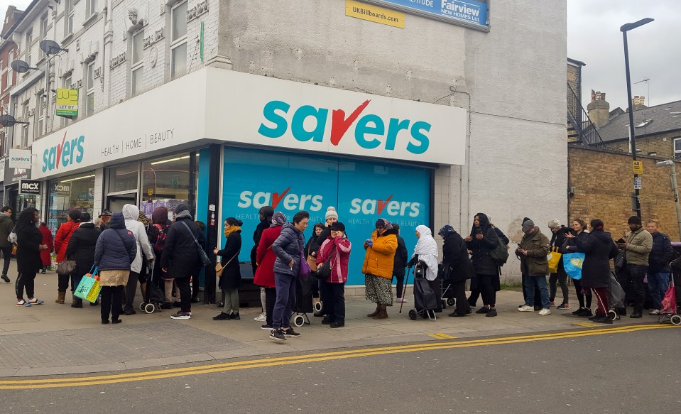  A queue outside a London branch of Savers