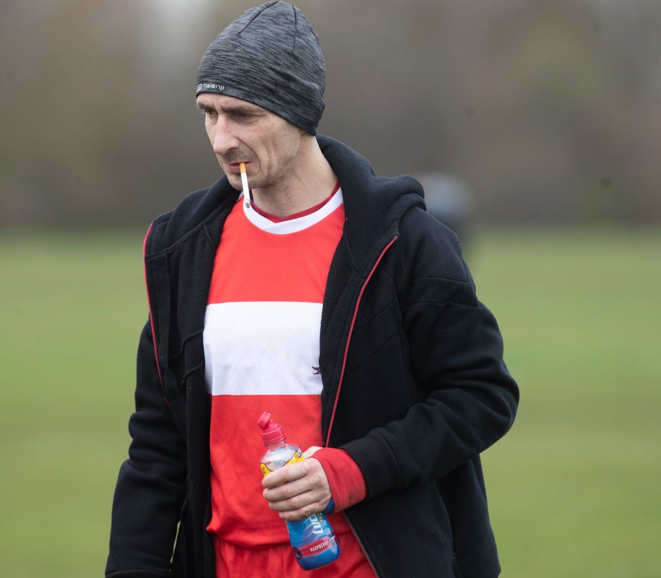  Patryk Reszke sparks up a cigarette during the half-time break