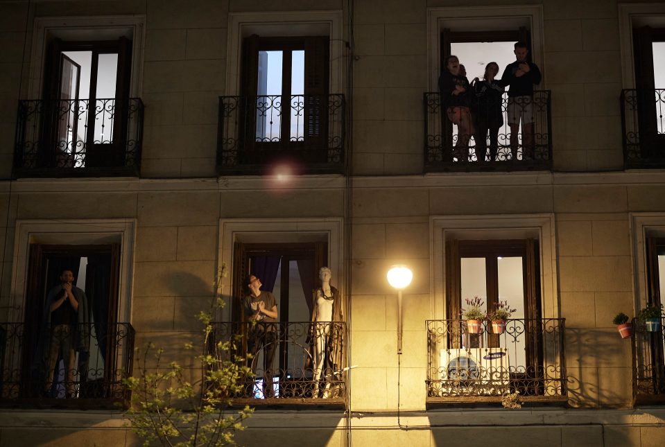  People can be seen in their homes just a few hours before the country plunges into lockdown