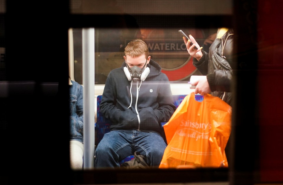  Londoners are taking extra precautions by wearing masks on the Tube