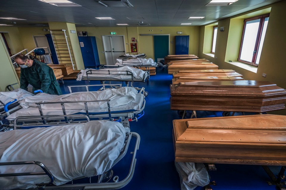  The morgue of the Ponte San Pietro Hospital, where bodies of victims are prepared for burial