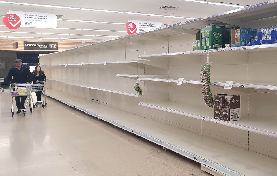  Empty shelves are seen here at at Tesco Superstore in Kent before 9am