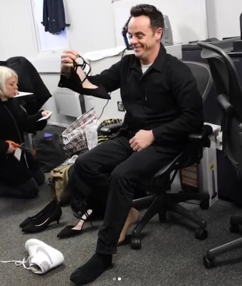  Ant can't stop smiling as he admires one of his shoes