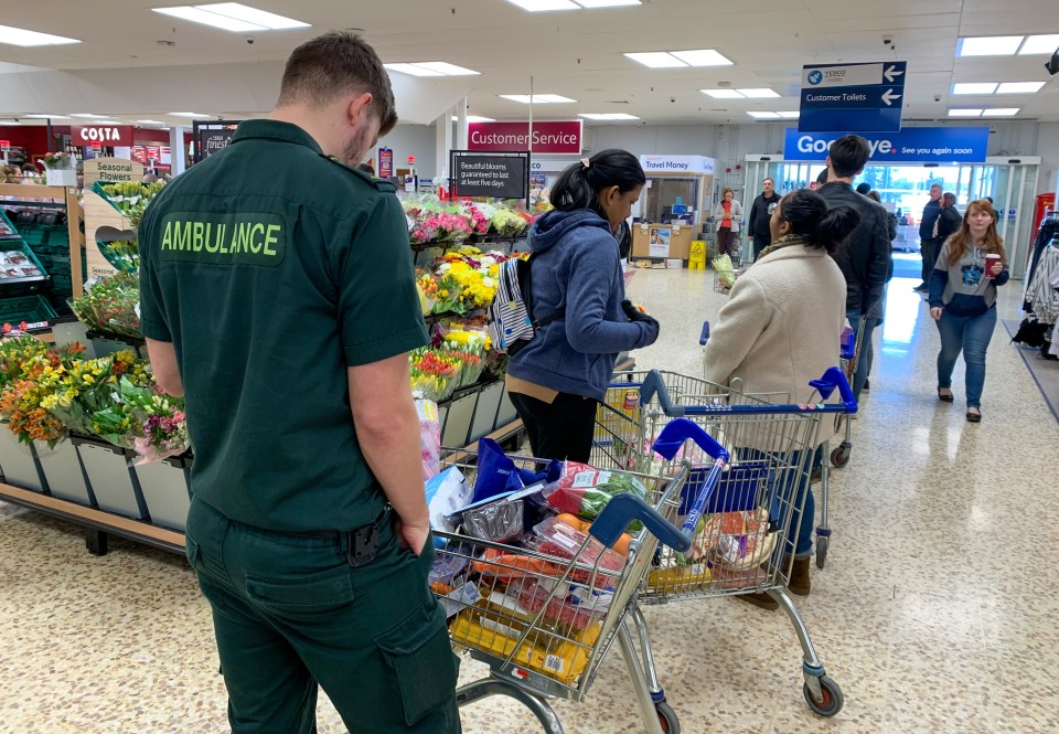  A paramedic queues in Tesco