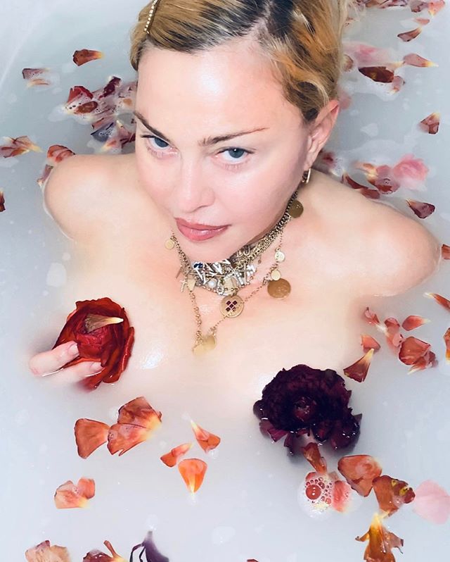  Madonna baffled Instagram users fans with her wrinkle-free face as she stripped off to take a bath