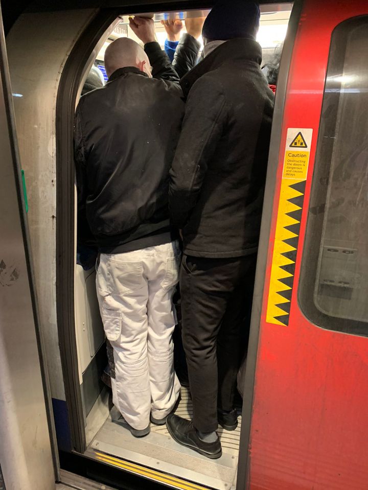  Commuters cram onto the Tube despite warnings from Government and London Mayor Sadiq Khan not to travel unless you have a "critical" job