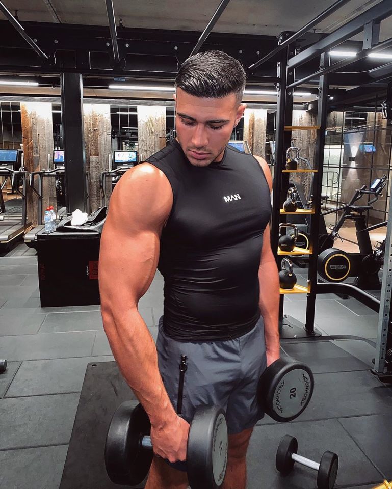  Tommy Fury also posed in a gym before leisure centres were closed on Friday