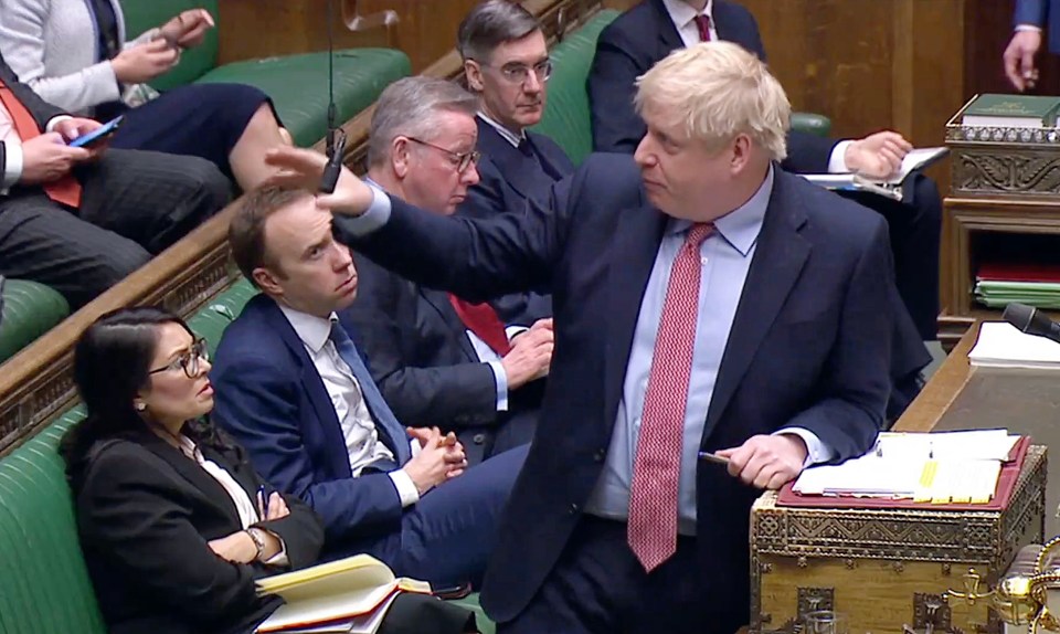  Pictured at PMQs, Boris Johnson and Matt Hancock, who have both tested positive for coronavirus, are packed in with fellow MPs for the flagship session in the House of Commons