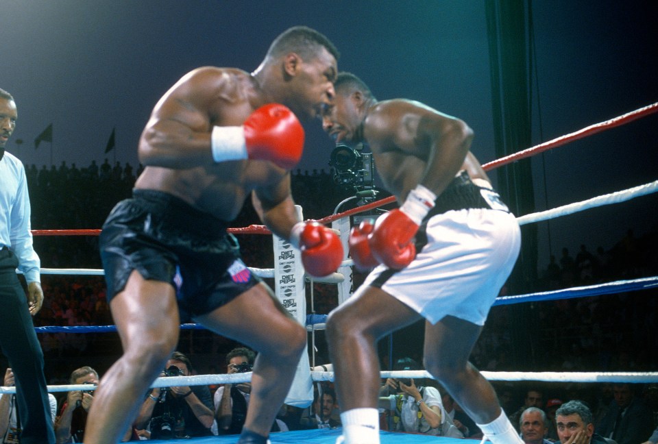  Mike Tyson in action before his incredible win over Henry Tillman