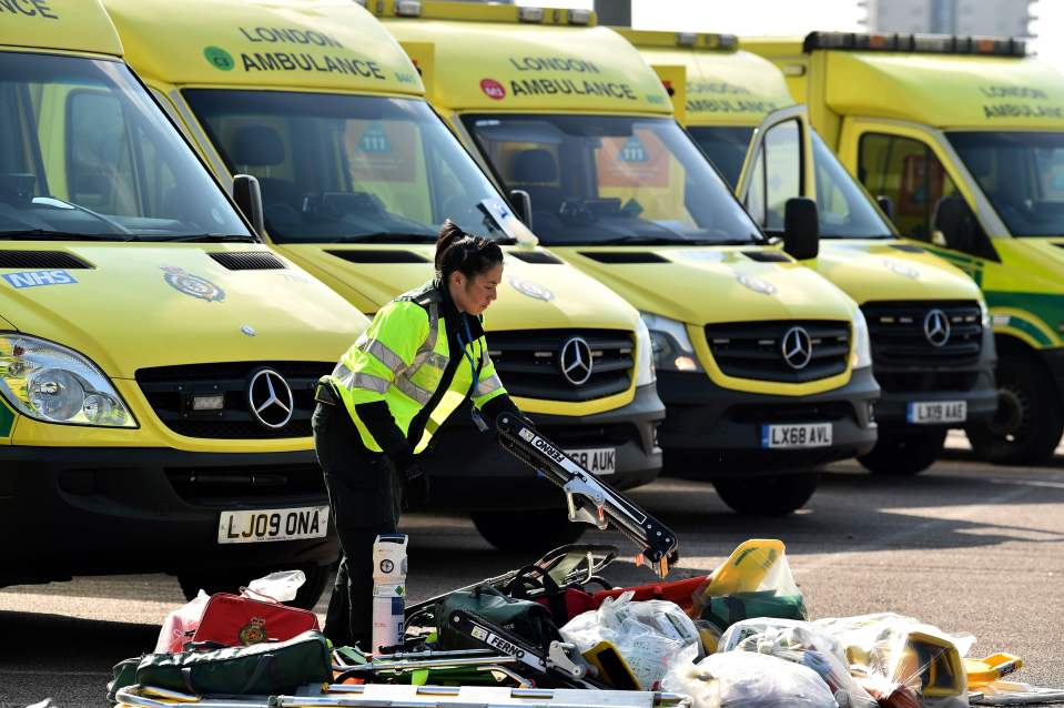  Staff load equipment into London ambulances at the ExCeL London exhibition centre in London