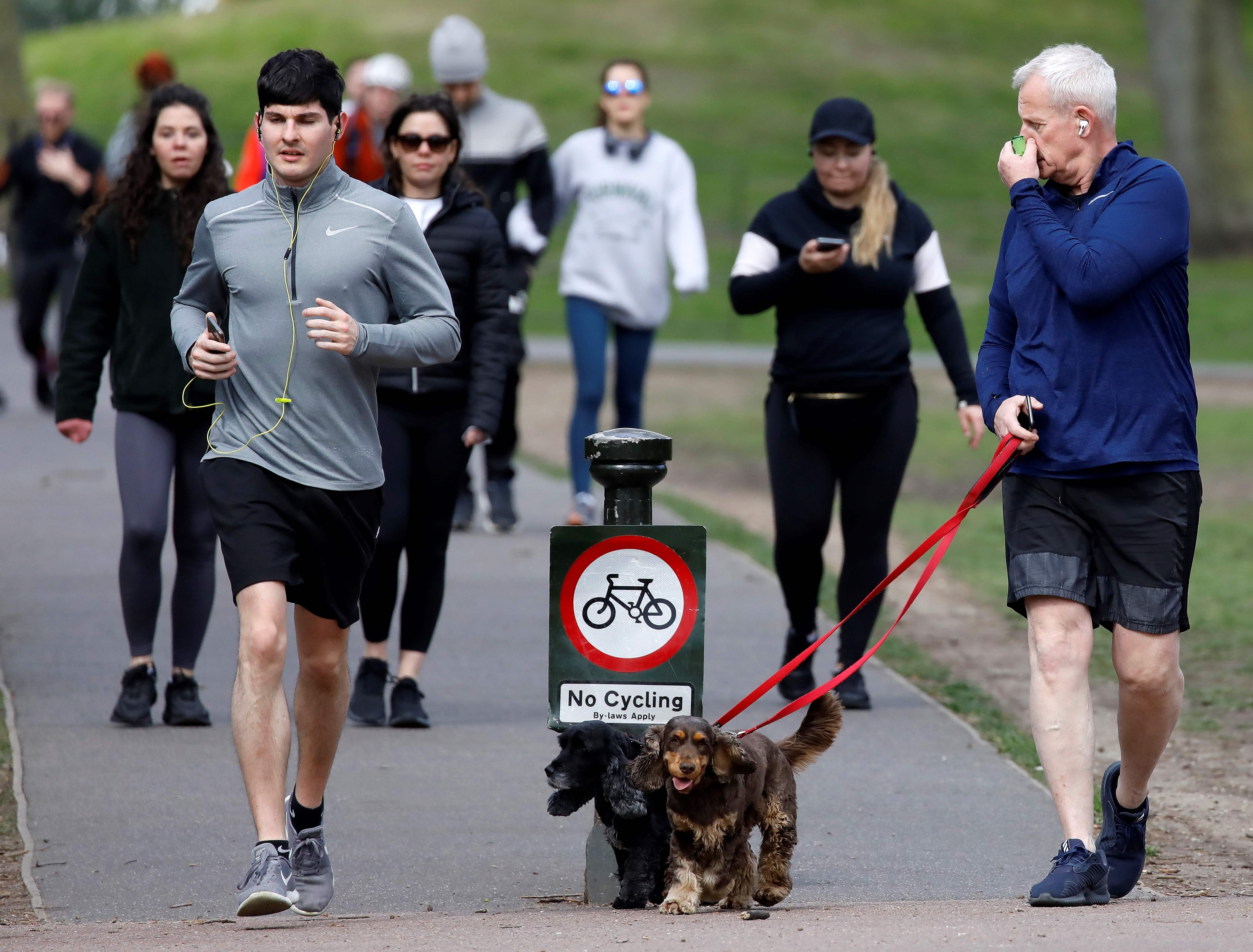  Joggers and dog walkers flocked to Battersea Park today, despite social distancing orders