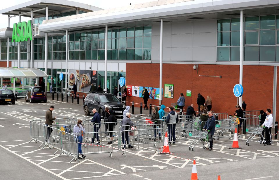  Shoppers keep their distance to avoid the spread of coronavirus