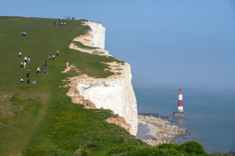  A large area of the cliffs at Beachy Head collapsed under the weight of people fooled by a daft prank