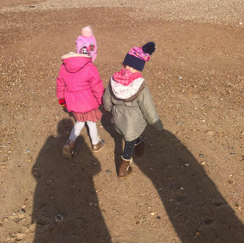  The couple's two girls, Eva and Lexi enjoy a walk in the countryside in a picture posted to Kelly Fitzgibbon's Facebook last week