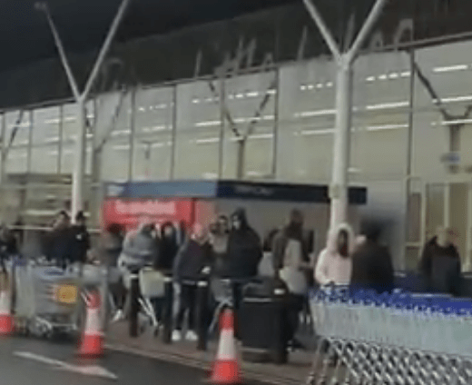 Customers were seen queuing up outside a Tesco store in Romford, East London, at 6am