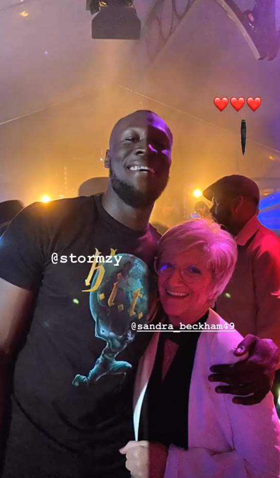  David's mum Sandra beamed as she posed with Stormzy