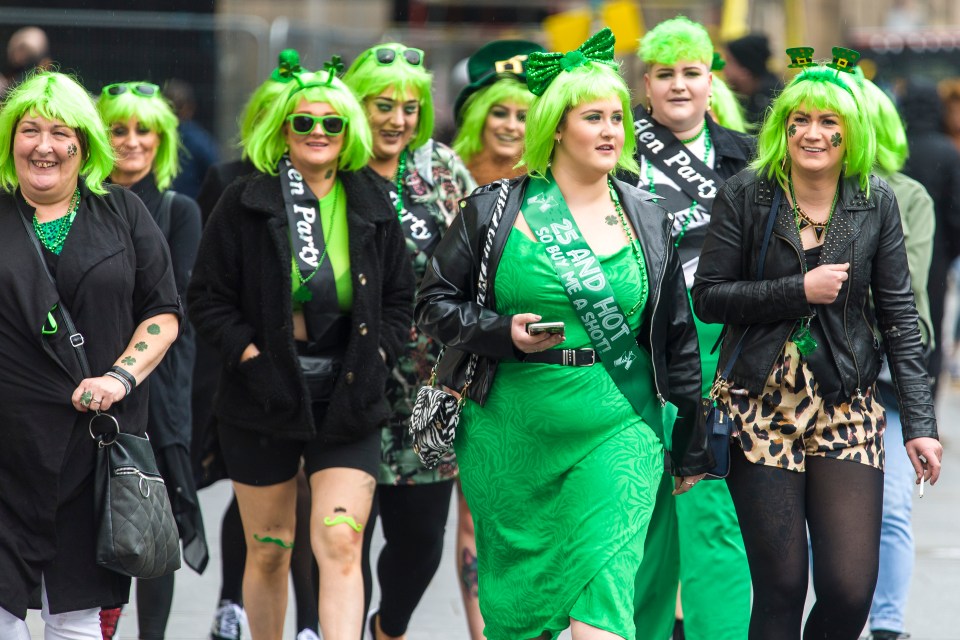  A hen party are spotted on Edinburgh's Royal mile forgetting about the Corona virus to celebrate St.Patricks's Day.