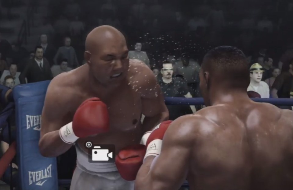 Virtual sweat flows off th face of George Foreman as he tries in vain to hold his ground againt Mike Tyson