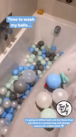 Stacey washes the kids' balls in the bath