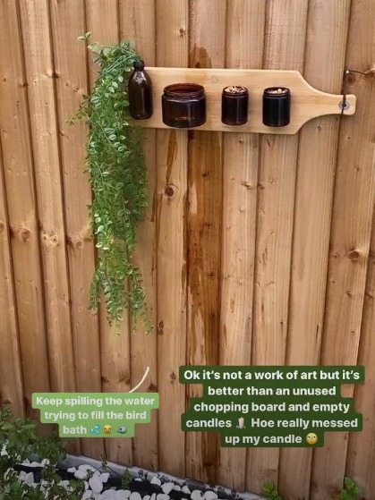 She used an old chopping board to assemble the candles and stick them to the garden fence