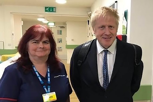  Sara Trollope, 51, pictured with Boris in April last year, tragically passed away after working for the NHS for 33 years