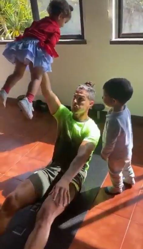  Cristiano Ronaldo barely broke a sweat as he lifted his daughter Eva Maria into the air