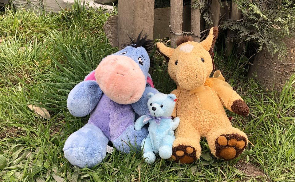  Cuddly toys are left in tribute to the family near the home in Woodmancote, West Sussex