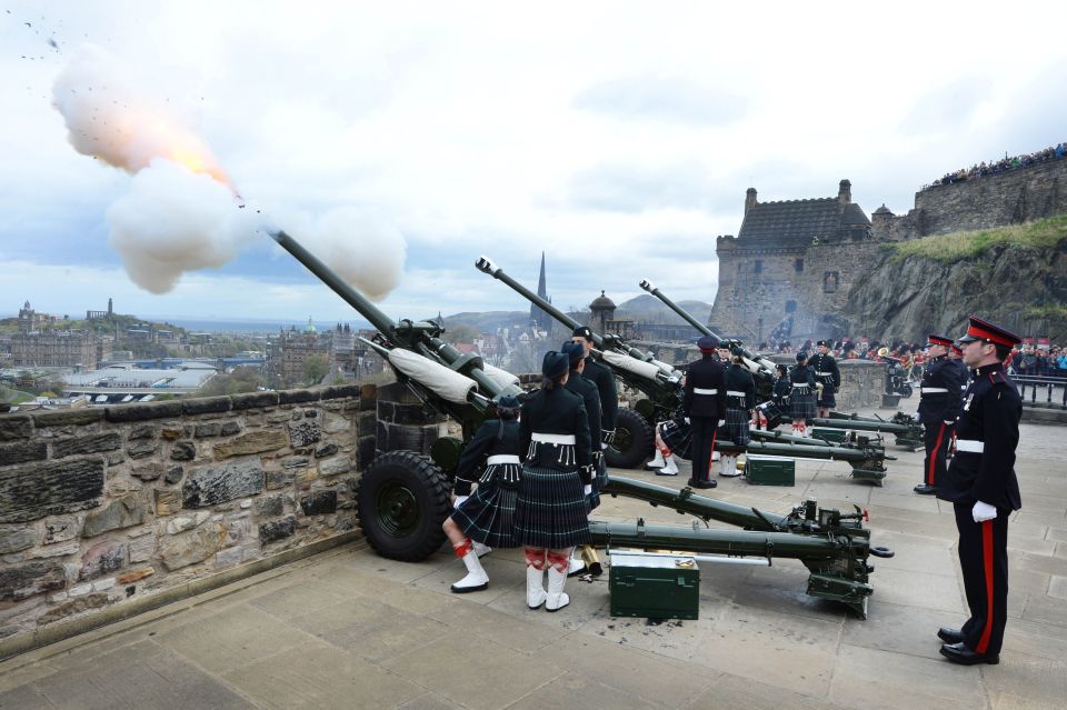  A gun salute at Edinburgh Castle is pictured to mark the Queen's 91st birthday