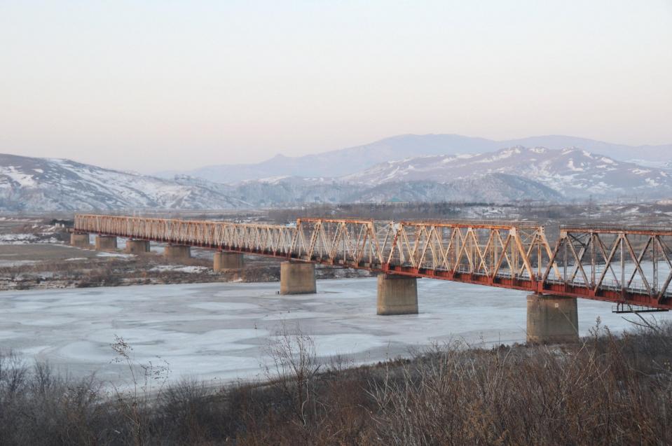 The Tuman River crossing is a major defecting staging post